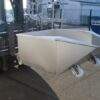 Tilting stainless steel bin with hydraulic assistance